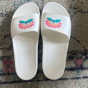 CROCS White Slide Sandals with Turquoise and Pink Floral Charm